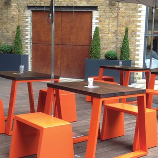 Muzo's Block table and bench with orange design