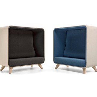 A pair of sound proof Box Lounger sofas with wooden legs in grey and blue
