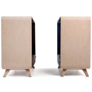 A pair of sound proof Box Lounger sofas with wooden legs