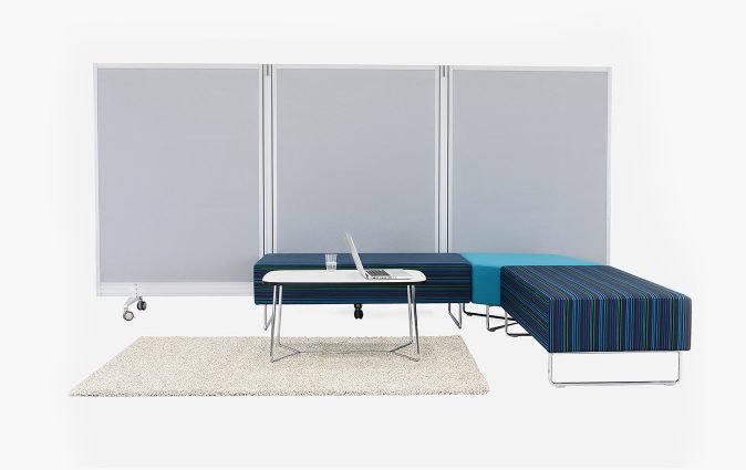 Muzo Flow portable folding walls used as room dividers in office space