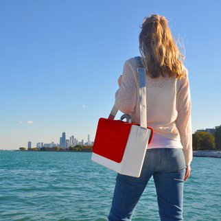 Stylish woman carries HB-Two personal storage box