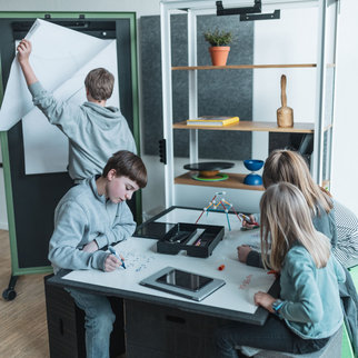Students hard at work using the Xbrick in a multifunctional space